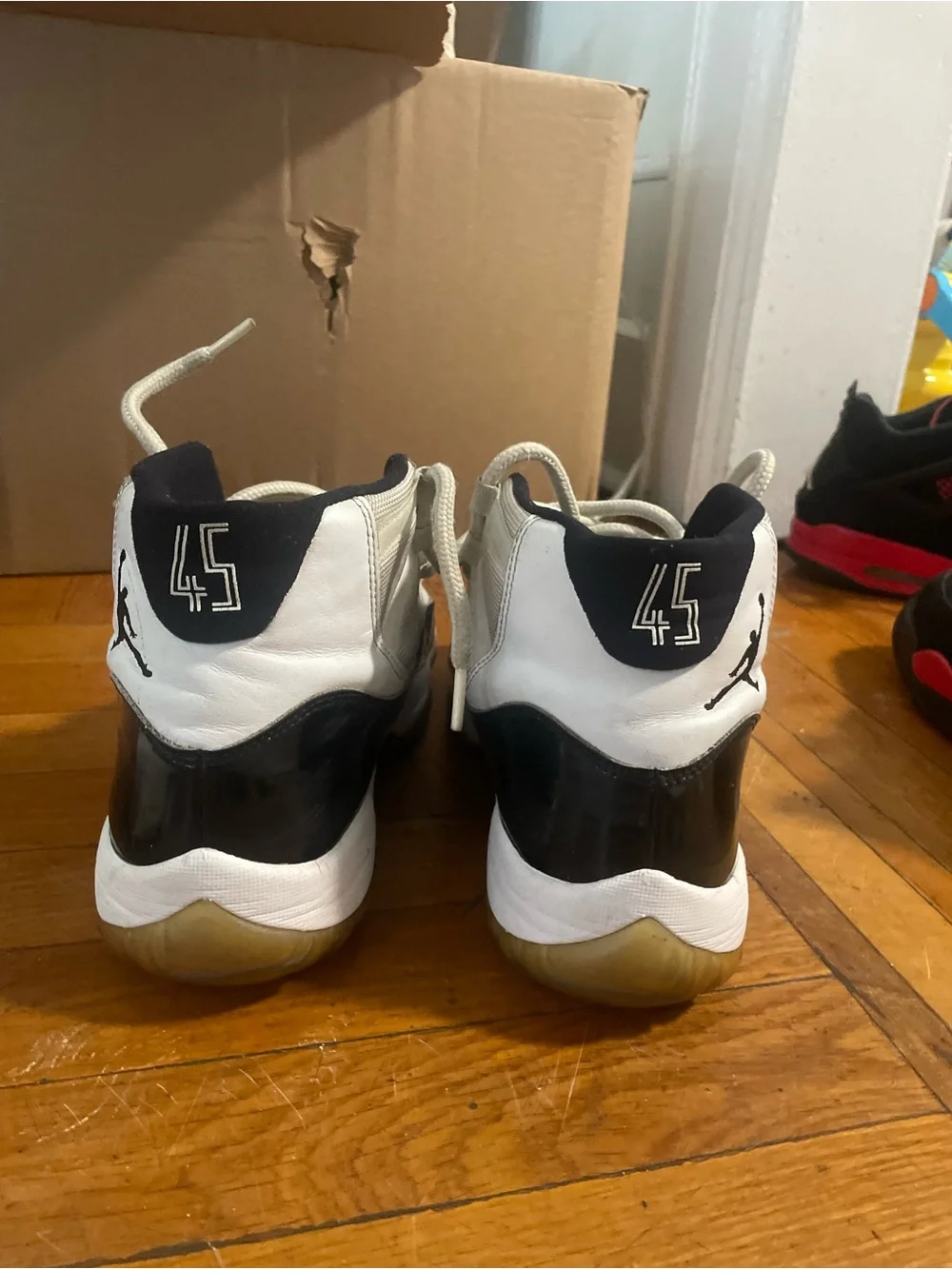 Jordan Men's Black and White High Top Sneakers